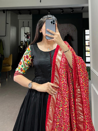 Black Dola Silk Gown with Patola Print Dupatta – Modern Elegance with Foilwork Flair