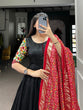 Load image into Gallery viewer, Black Dola Silk Gown with Patola Print Dupatta – Modern Elegance with Foilwork Flair