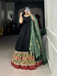 Load image into Gallery viewer, Black Dola Silk Gown with Patola Print Dupatta – Modern Elegance with Foilwork Flair