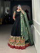 Load image into Gallery viewer, Black Dola Silk Gown with Patola Print Dupatta – Modern Elegance with Foilwork Flair
