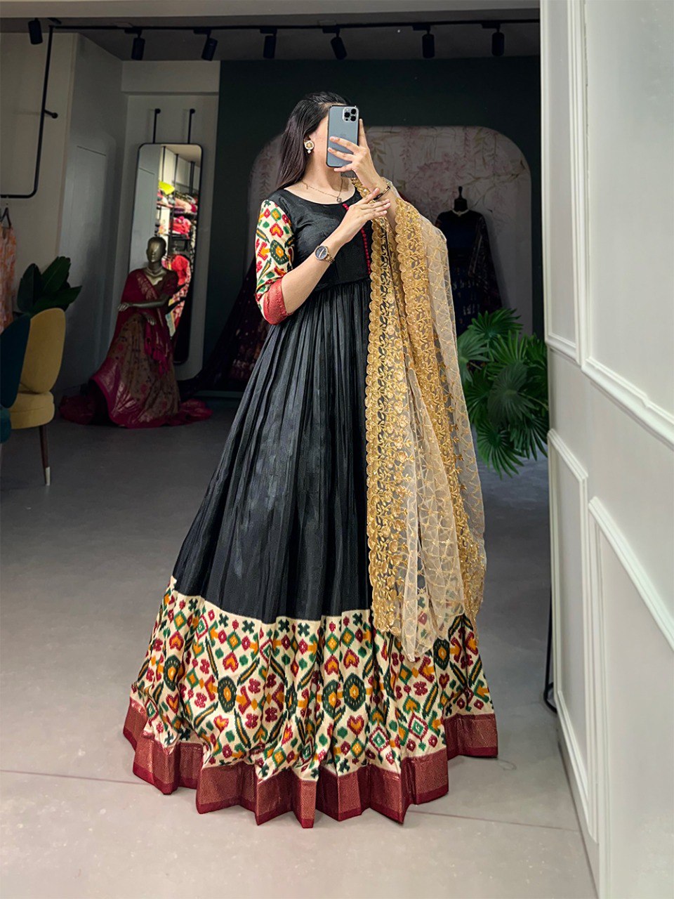 Black Dola Silk Gown with Patola Print Dupatta – Modern Elegance with Foilwork Flair