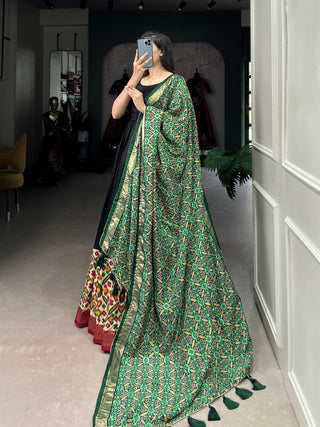 Black Dola Silk Gown with Patola Print Dupatta – Modern Elegance with Foilwork Flair