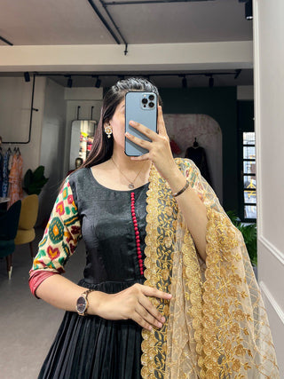 Black Dola Silk Gown with Patola Print Dupatta – Modern Elegance with Foilwork Flair