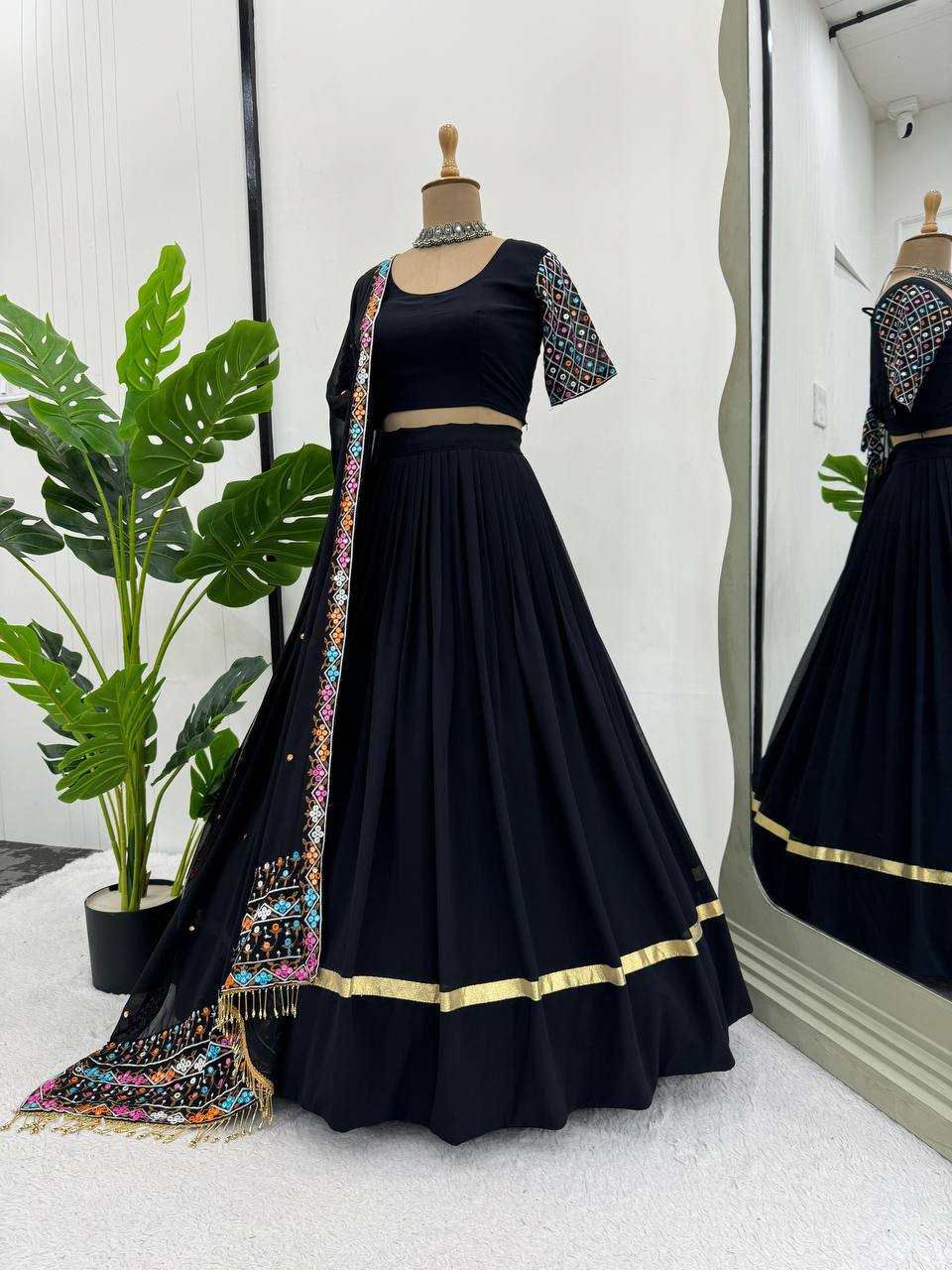 Black Elegant Faux Georgette Semi-Stitched Lehenga Choli Set with Dupatta ClothsVilla Main image