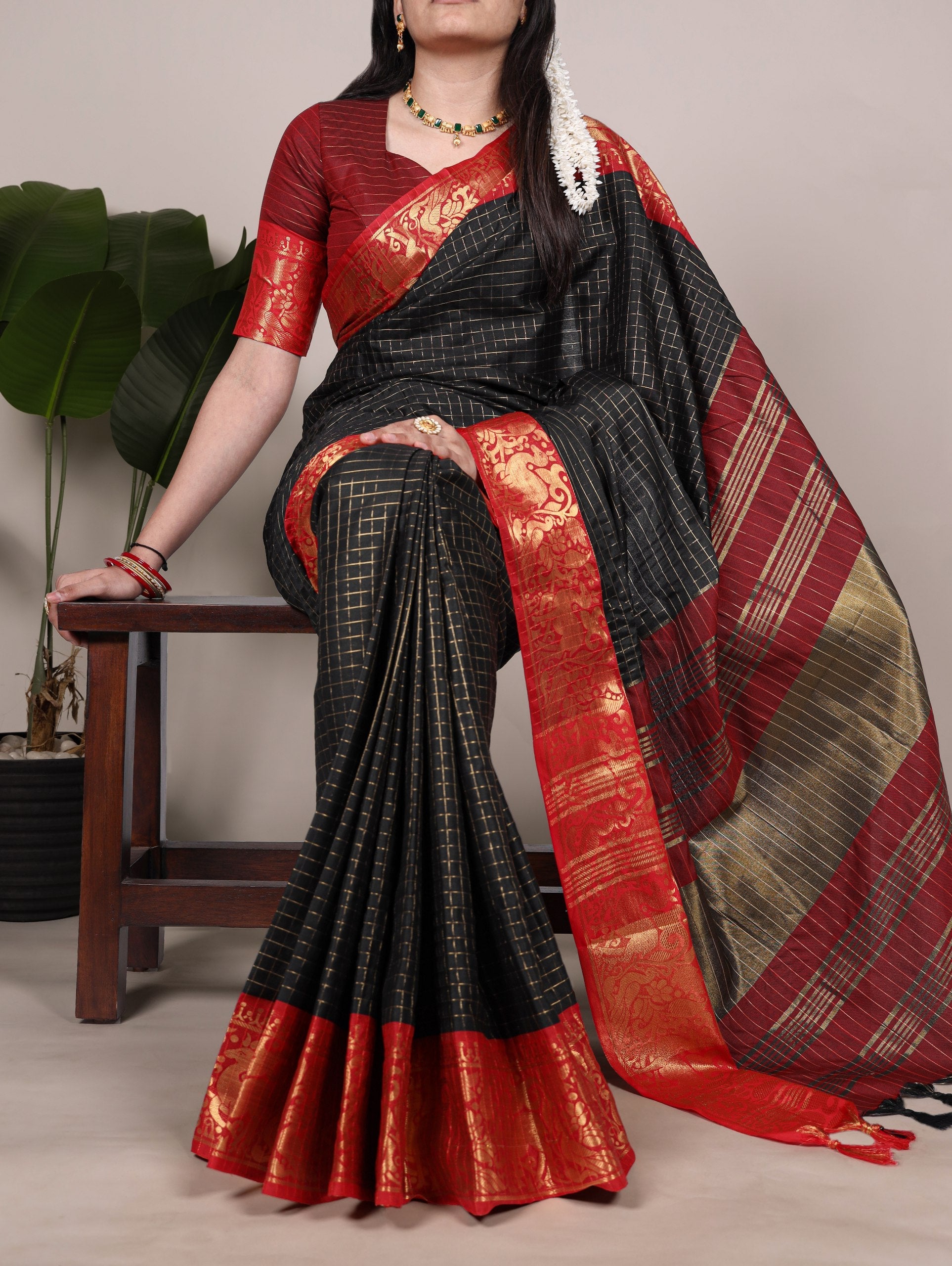 Black Elegant Poly Cotton Saree with Chex Zari Weaving ClothsVilla Main image