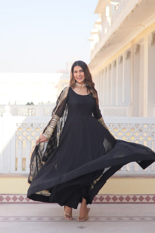 Black Faux Blooming Gown with Dupatta Featuring Attractive Embroidered Sequins Work and Lace Border ClothsVilla