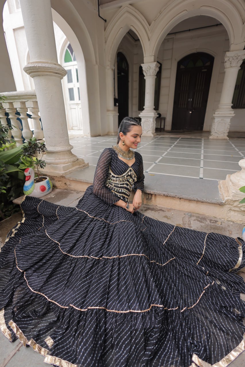 Black Navratri Special Leheriya Print Lehenga Choli with 12 Mtr Flair & Mirror Lace Work ClothsVilla