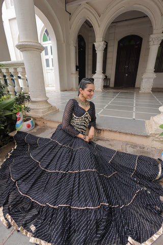 Black Navratri Special Leheriya Print Lehenga Choli with 12 Mtr Flair & Mirror Lace Work ClothsVilla