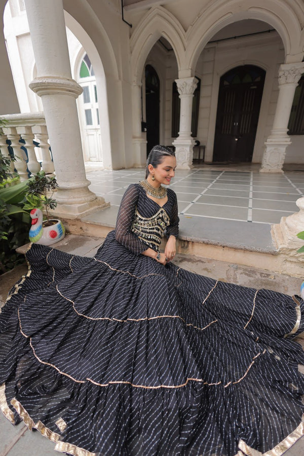 Black Navratri Special Leheriya Print Lehenga Choli with 12 Mtr Flair & Mirror Lace Work ClothsVilla