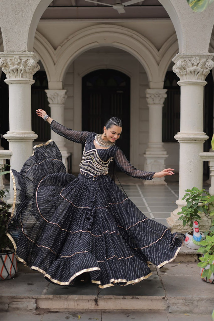 Black Navratri Special Leheriya Print Lehenga Choli with 12 Mtr Flair & Mirror Lace Work ClothsVilla
