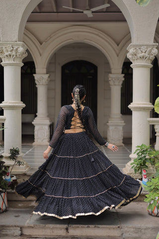 Black Navratri Special Leheriya Print Lehenga Choli with 12 Mtr Flair & Mirror Lace Work ClothsVilla