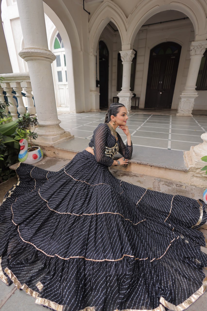 Black Navratri Special Leheriya Print Lehenga Choli with 12 Mtr Flair & Mirror Lace Work ClothsVilla