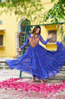 Load image into Gallery viewer, Blue Bandhani Print Faux Georgette Gown with Kutchi Patchwork – Full Sleeves, 9 Meter Flair, Cotton Lining ClothsVilla