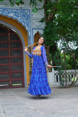 Blue Faux Georgette Bandhani Print Gown with Kutchi Patchwork – Full Sleeves, 12 Meter Flair, Cotton Lining ClothsVilla