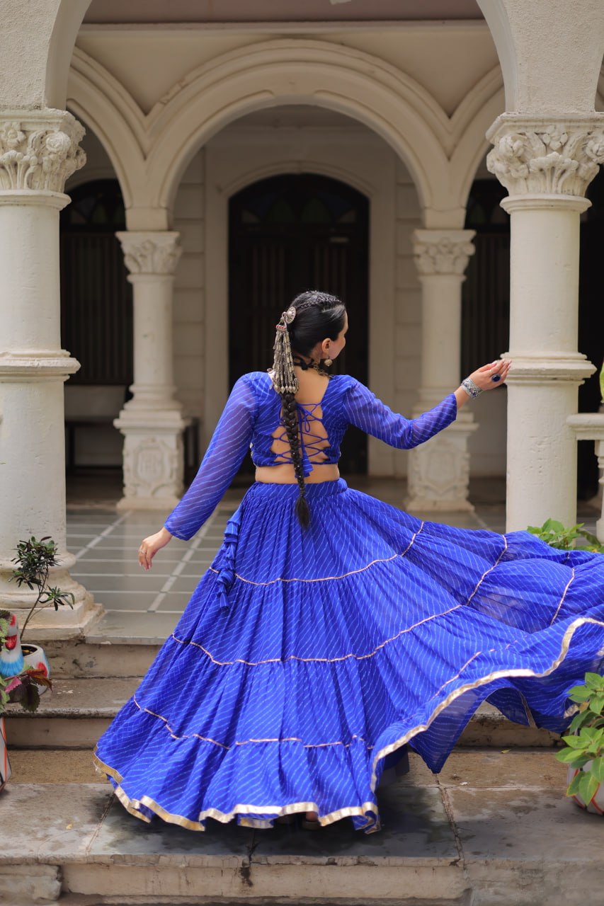 Blue Navratri Special Leheriya Print Lehenga Choli with 12 Mtr Flair & Mirror Lace Work ClothsVilla