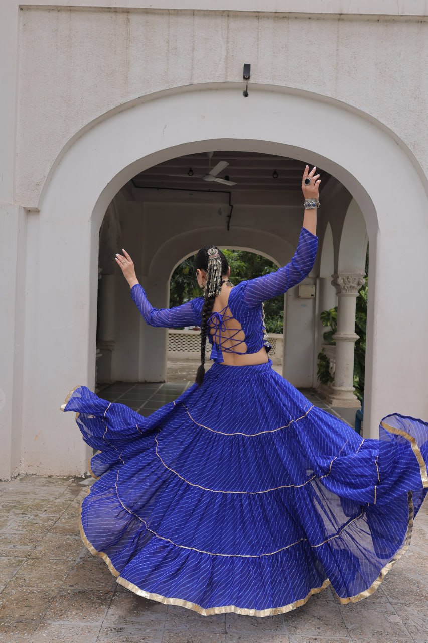 Blue Navratri Special Leheriya Print Lehenga Choli with 12 Mtr Flair & Mirror Lace Work ClothsVilla