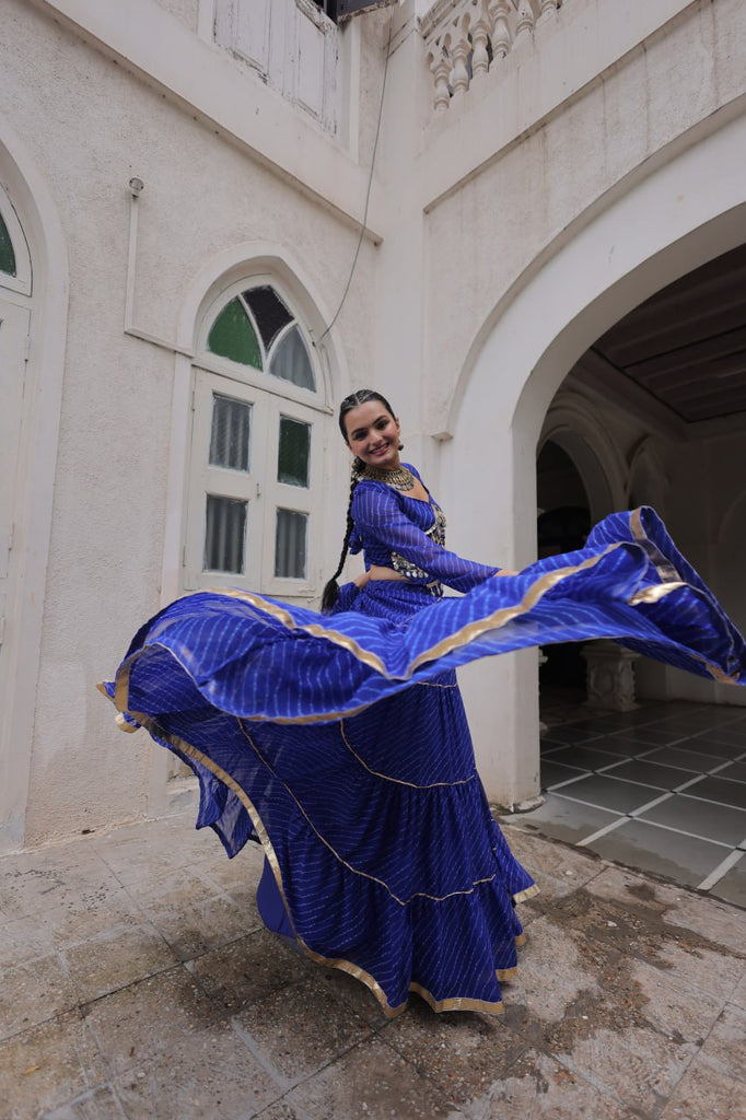 Blue Navratri Special Leheriya Print Lehenga Choli with 12 Mtr Flair & Mirror Lace Work ClothsVilla