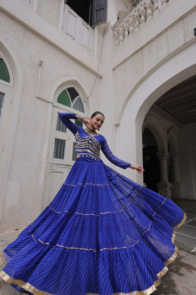 Blue Navratri Special Leheriya Print Lehenga Choli with 12 Mtr Flair & Mirror Lace Work ClothsVilla