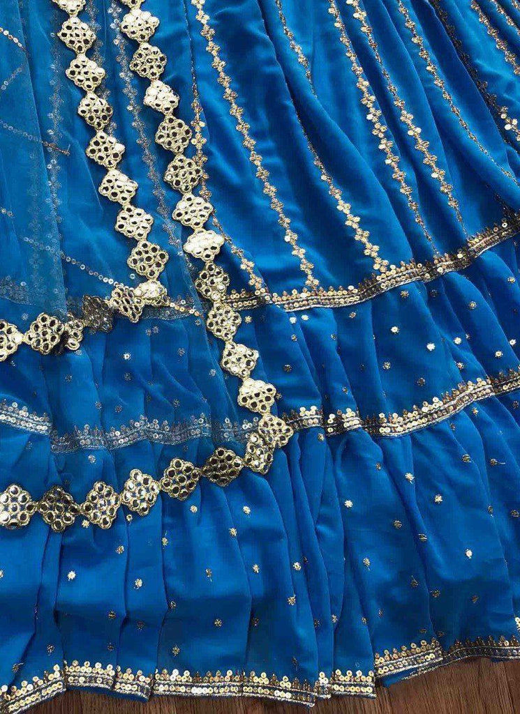 Blue Stunning Georgette Semi-Stitched Lehenga with Ruffle Border Sequins, Heavy Embroidered Faux Georgette Blouse, and Soft Net Dupatta ClothsVilla