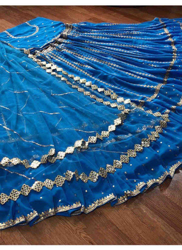 Blue Stunning Georgette Semi-Stitched Lehenga with Ruffle Border Sequins, Heavy Embroidered Faux Georgette Blouse, and Soft Net Dupatta ClothsVilla
