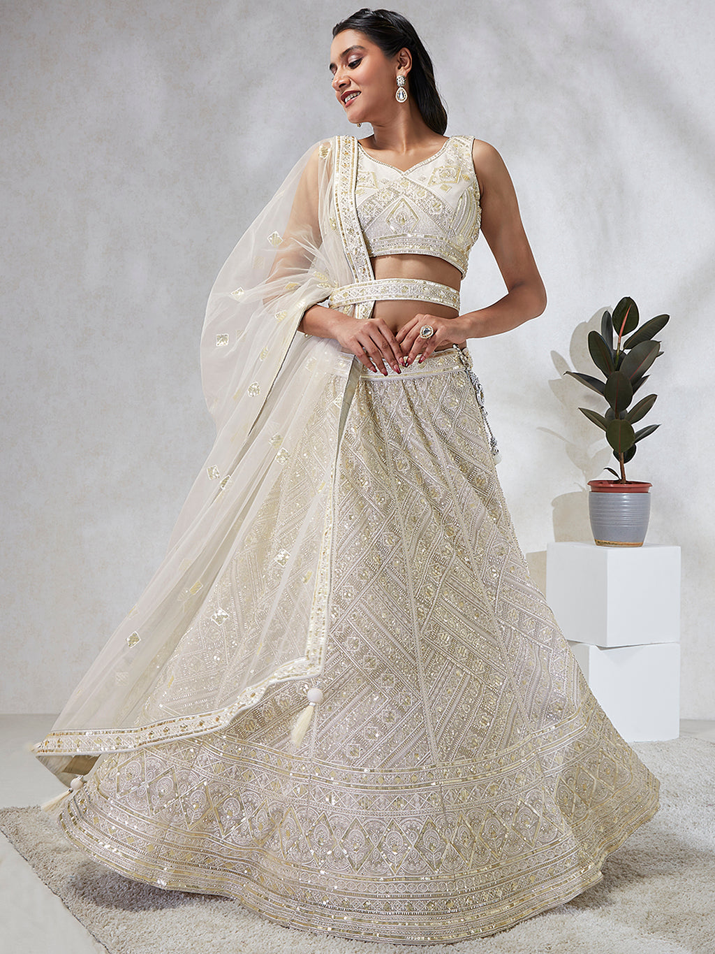 Breathtaking Cream Net Lehenga Choli Set with Cutdana, Sequin & Zarkan Work ClothsVilla