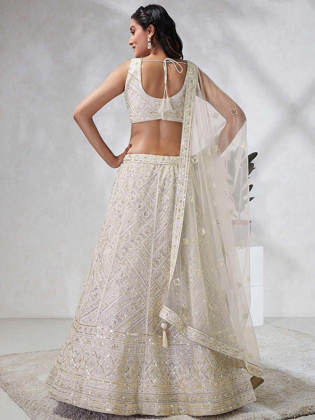Breathtaking Cream Net Lehenga Choli Set with Cutdana, Sequin & Zarkan Work ClothsVilla