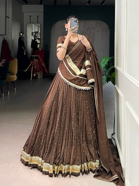 Brown Elegant Pure Chanderi Zari Weaving Lehenga Set with Embossed Design & Lace Touch-Up – 6-Meter Flair Stitched Lehenga, Blouse & Dupatta ClothsVilla Main image