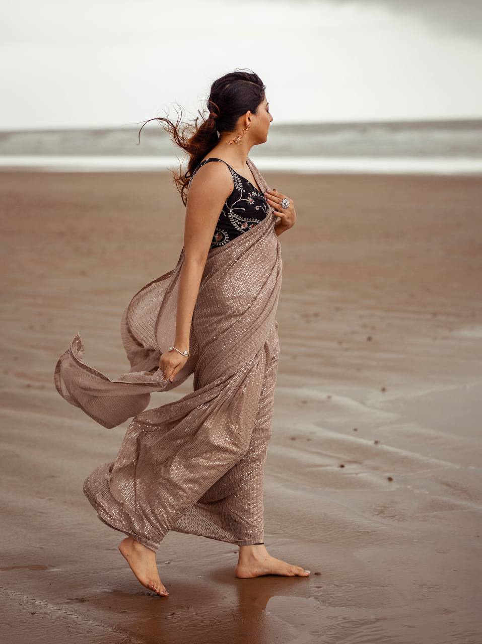 Brown Glow in Elegance – Skin Sequin Georgette Saree Clothsvilla