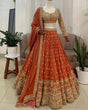 Load image into Gallery viewer, Burnt Orange Elegant Faux Georgette Embroidered Lehenga Choli with Dupatta ClothsVilla
