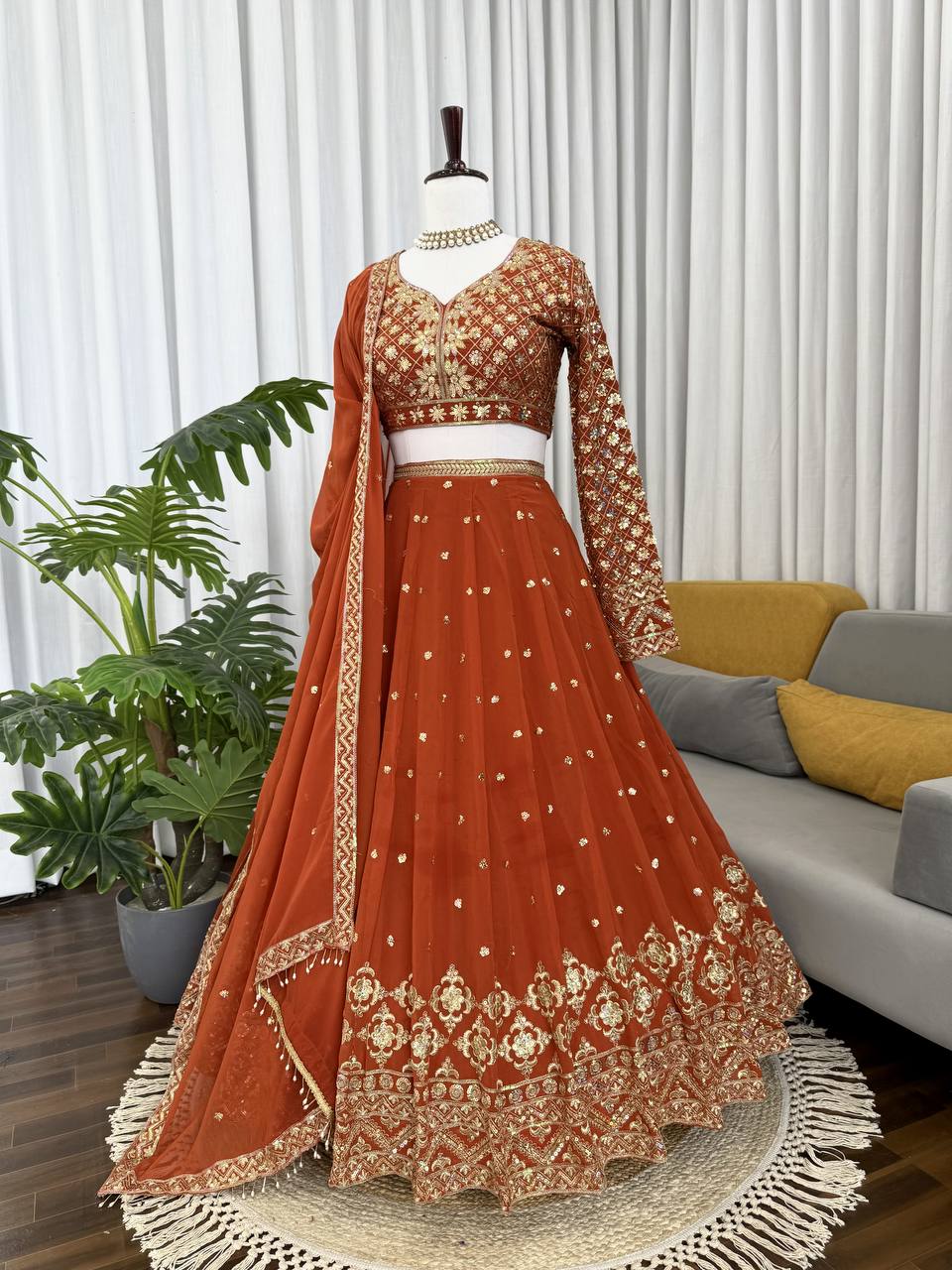 Burnt Orange Elegant Faux Georgette Embroidered Lehenga Choli with Dupatta ClothsVilla Main image