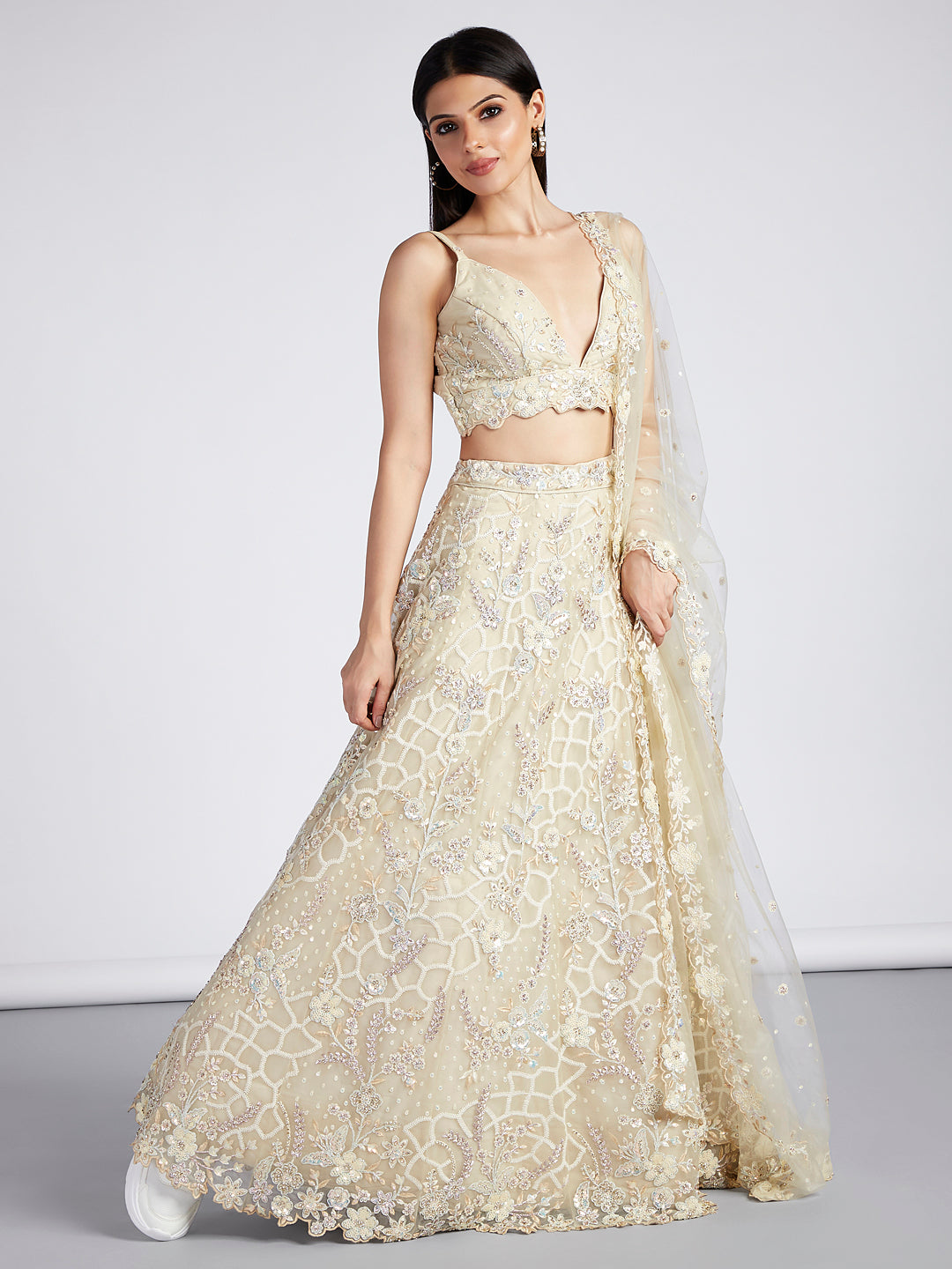 Captivating Cream Net Lehenga with Sequin & Zari Embellishments ClothsVilla