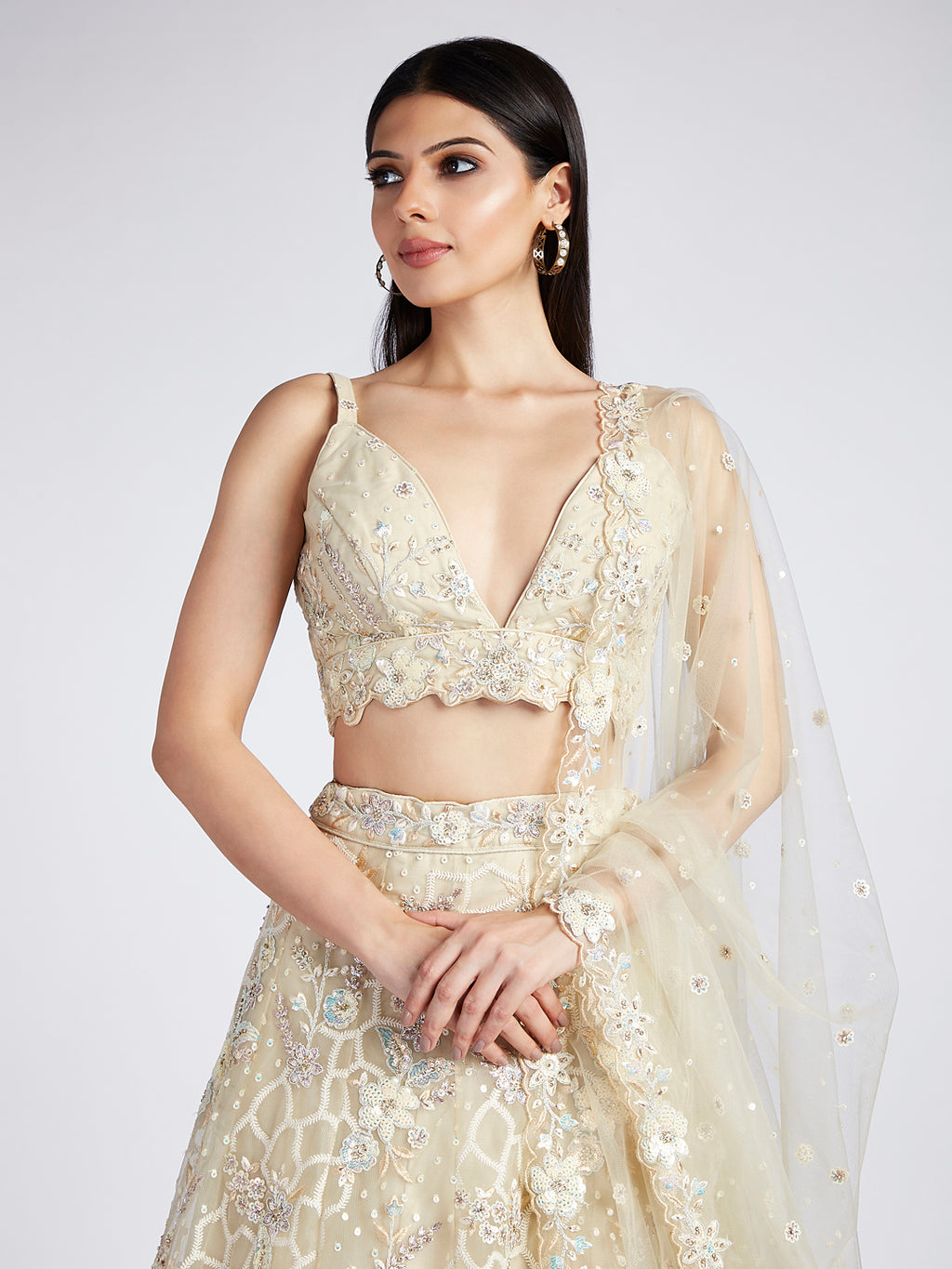 Captivating Cream Net Lehenga with Sequin & Zari Embellishments ClothsVilla