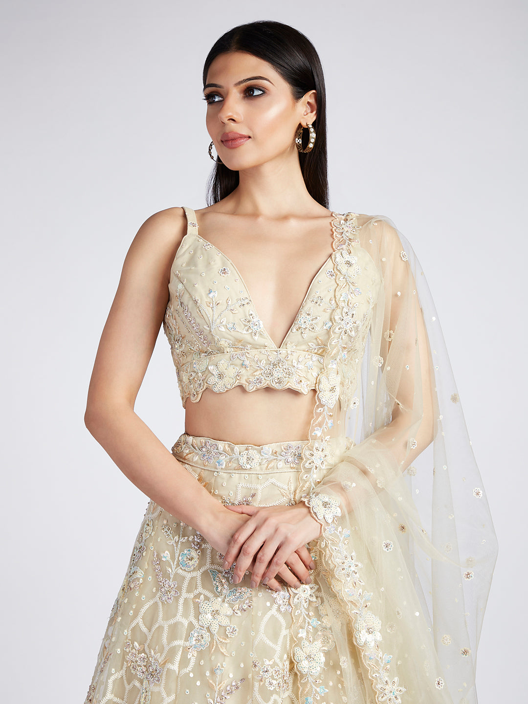 Captivating Cream Net Lehenga with Sequin & Zari Embellishments ClothsVilla