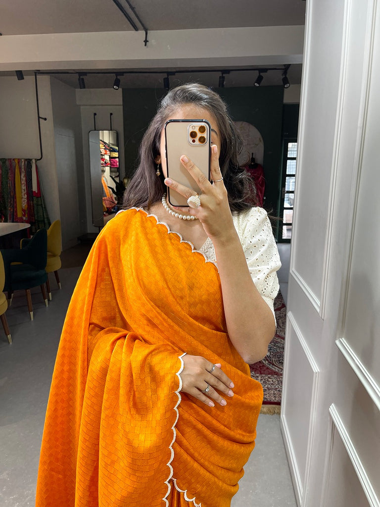 Celebrate in Style with our Orange Color Exquisite Arca Work Gadwal Chex Saree Collection ClothsVilla