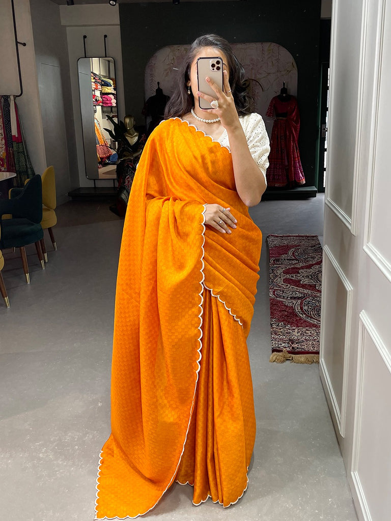 Celebrate in Style with our Orange Color Exquisite Arca Work Gadwal Chex Saree Collection ClothsVilla