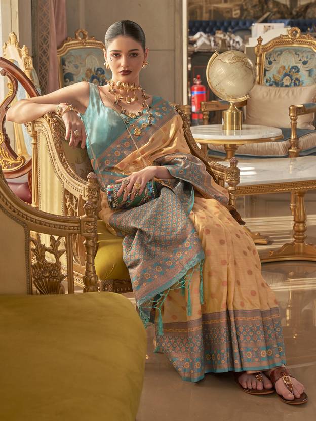 Chiku Graceful Woven Banarasi Silk Blend Saree with Tassel Detailing ClothsVilla