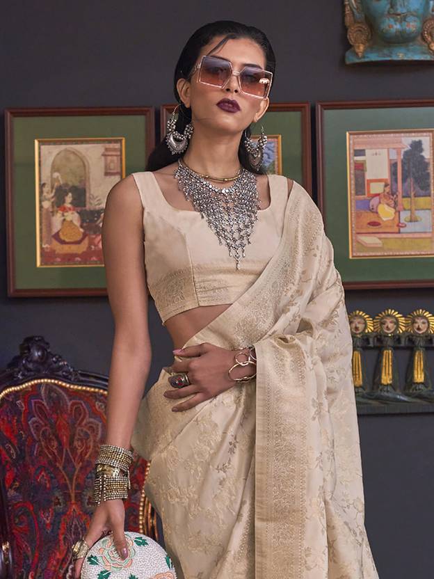 Cream Banarasi Silk Blend Saree with Bidri Work & Zari Buta – Gold Accents & Tassel Detailing ClothsVilla