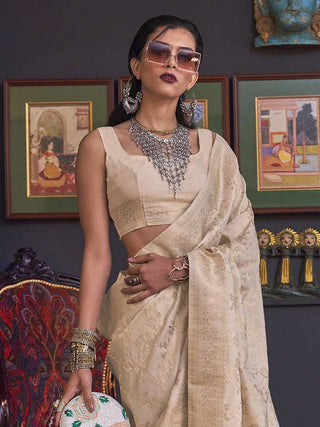 Cream Banarasi Silk Blend Saree with Bidri Work & Zari Buta – Gold Accents & Tassel Detailing ClothsVilla