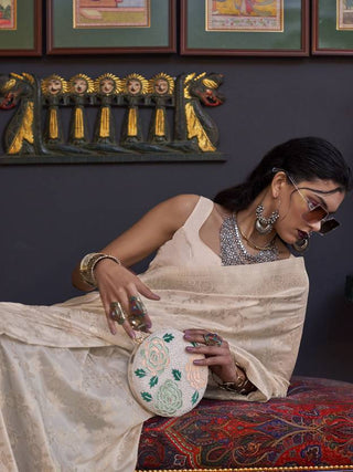 Cream Banarasi Silk Blend Saree with Bidri Work & Zari Buta – Gold Accents & Tassel Detailing ClothsVilla