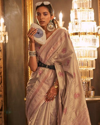 Cream Elegant Banarasi Silk Blend Saree with Woven Design & Tassel Detailing ClothsVilla