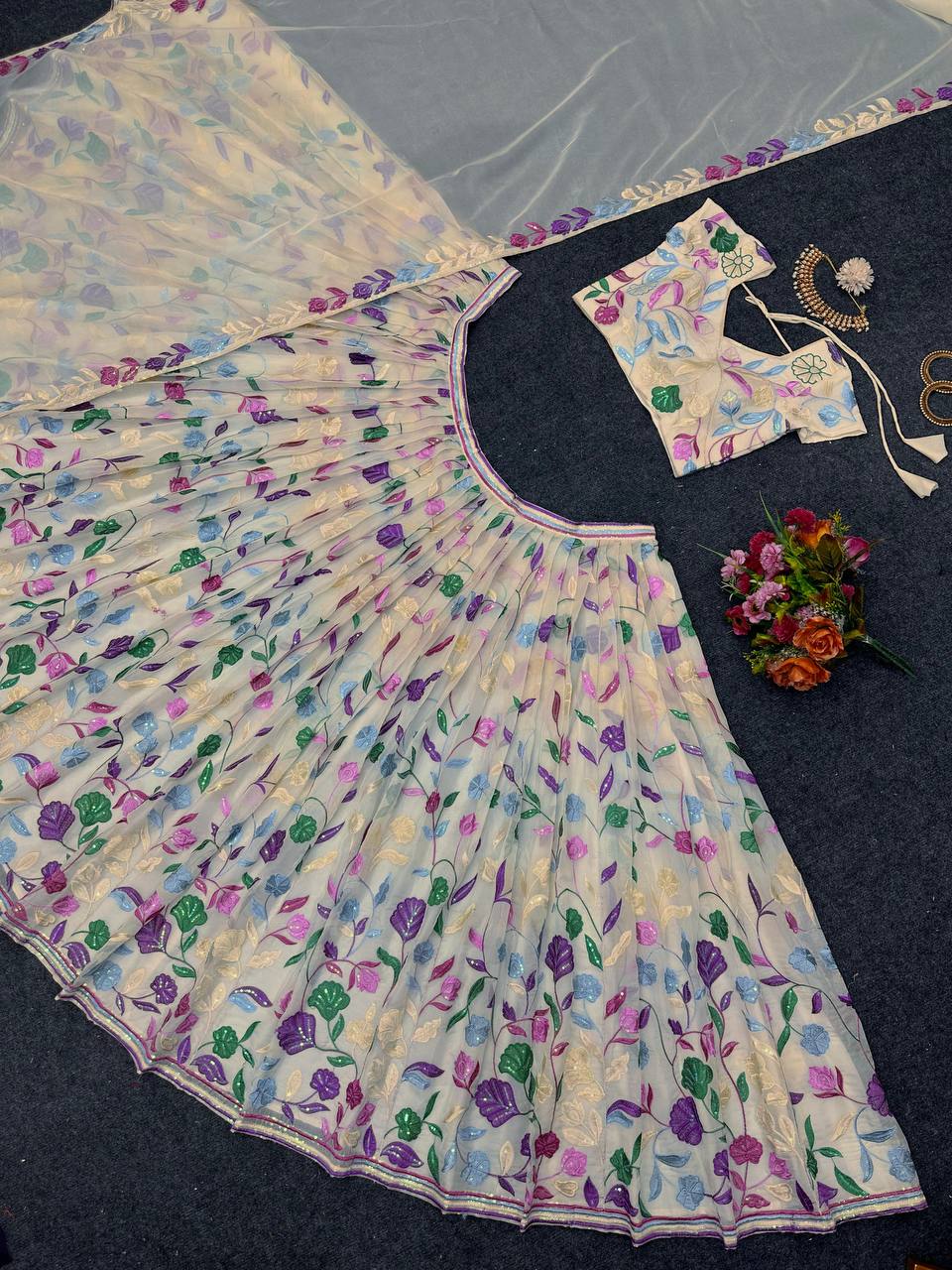 Cream Elegant Tabby Organza Semi-Stitched Lehenga Set with Sequence Work Clothsvilla