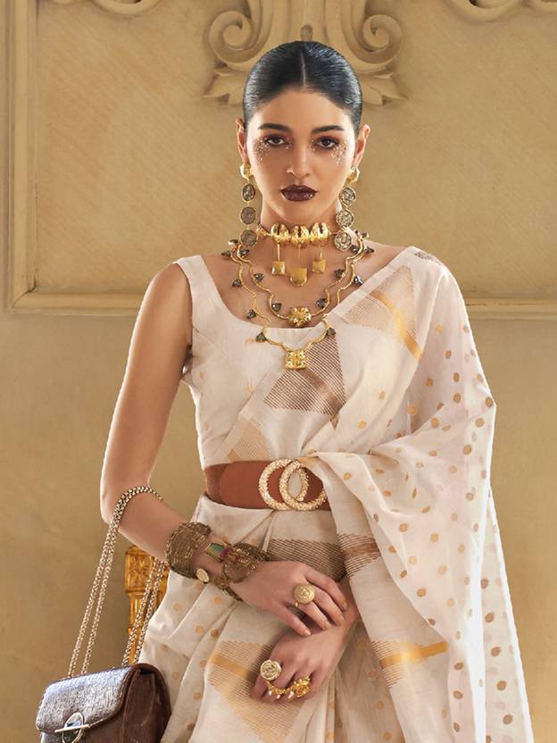 Cream Embroidered Banarasi Tissue Saree with Tassels ClothsVilla