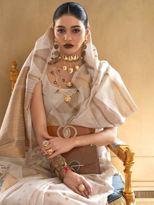 Cream Embroidered Banarasi Tissue Saree with Tassels ClothsVilla