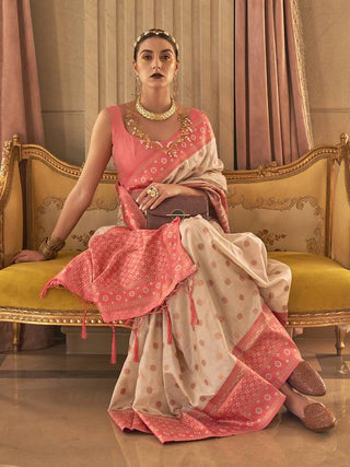 Cream Graceful Woven Banarasi Silk Blend Saree with Tassel Detailing ClothsVilla