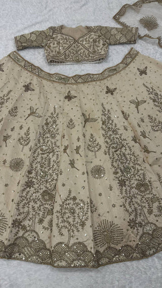 Cream Heavy Slub Silk Lehenga with Sequins, Dori & Zari Work, Matching Blouse & Net Dupatta ClothsVilla