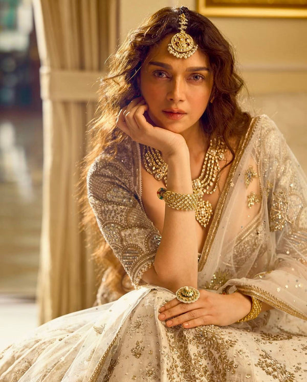 Cream Heavy Slub Silk Lehenga with Sequins, Dori & Zari Work, Matching Blouse & Net Dupatta ClothsVilla