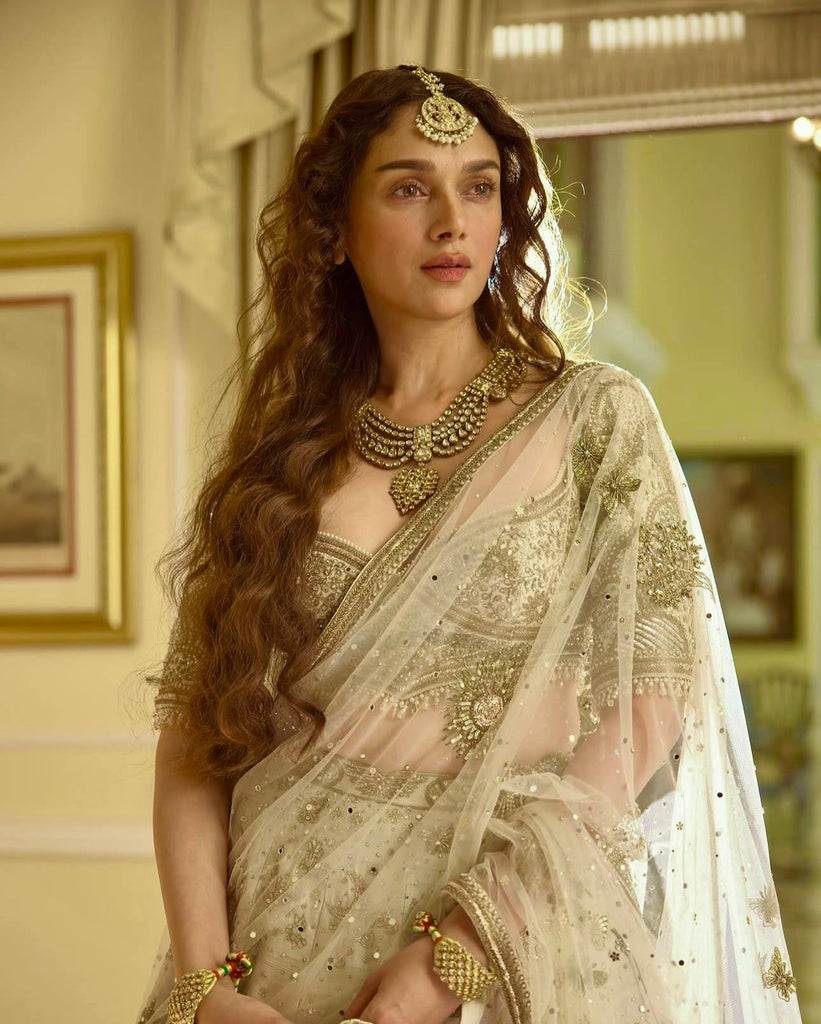 Cream Heavy Slub Silk Lehenga with Sequins, Dori & Zari Work, Matching Blouse & Net Dupatta ClothsVilla