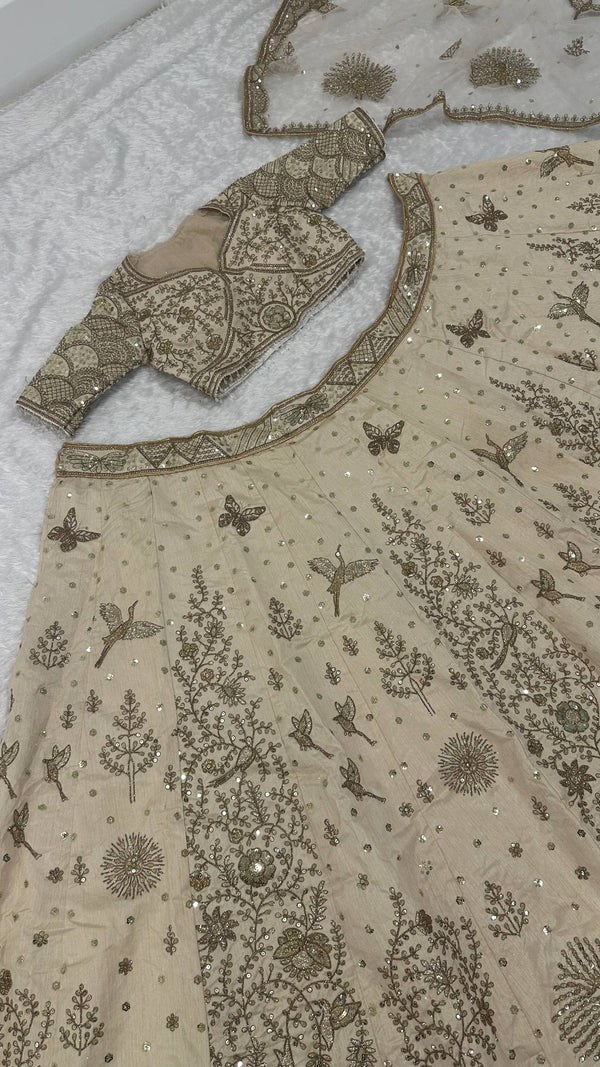 Cream Heavy Slub Silk Lehenga with Sequins, Dori & Zari Work, Matching Blouse & Net Dupatta ClothsVilla