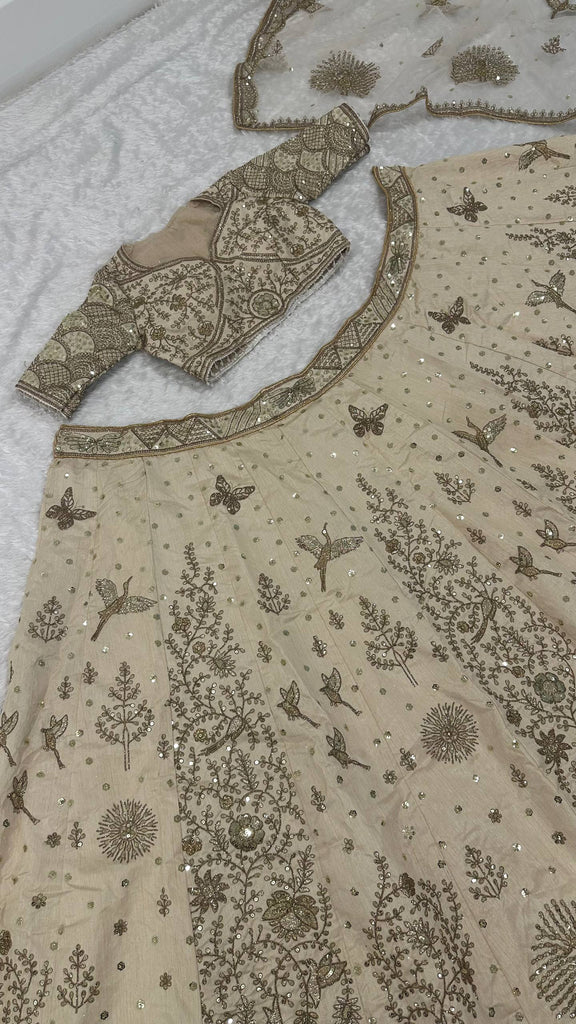 Cream Heavy Slub Silk Lehenga with Sequins, Dori & Zari Work, Matching Blouse & Net Dupatta ClothsVilla