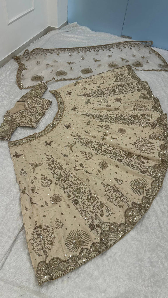 Cream Heavy Slub Silk Lehenga with Sequins, Dori & Zari Work, Matching Blouse & Net Dupatta ClothsVilla